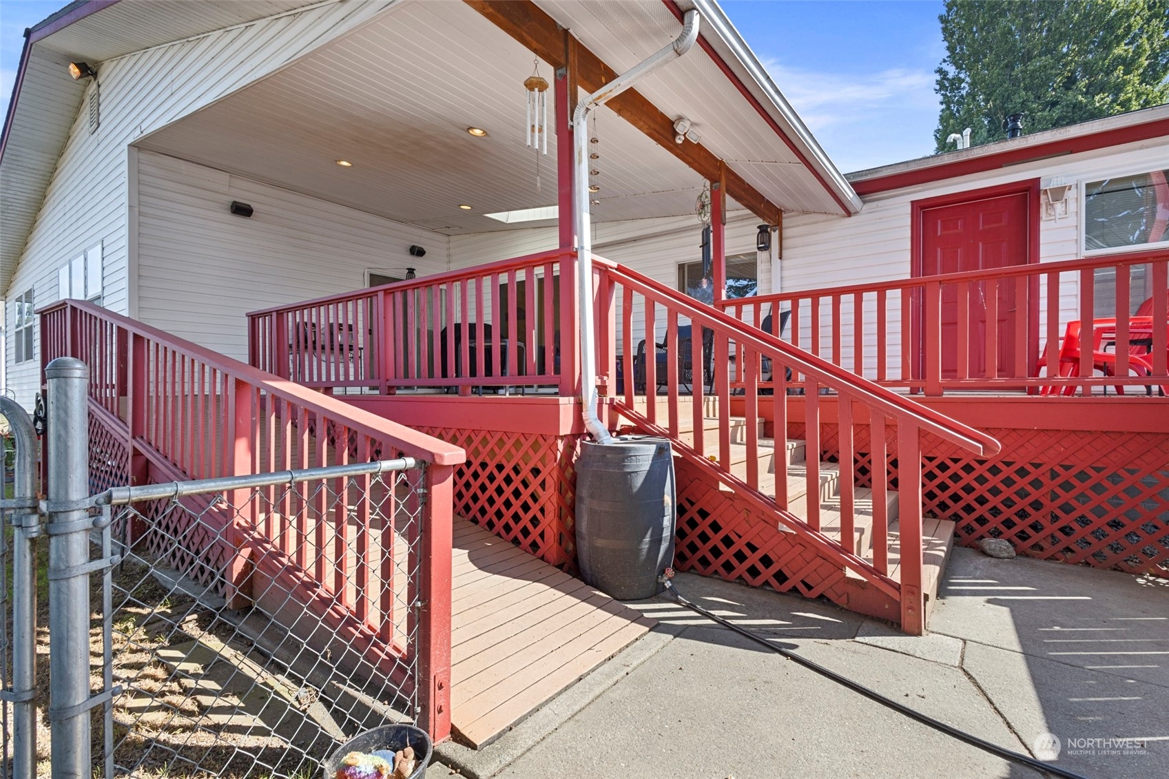 13846 Avon Allen Road Mount Vernon, WA 98273 - Photo 32 of 36 a view of staircase with wooden floor and white walls