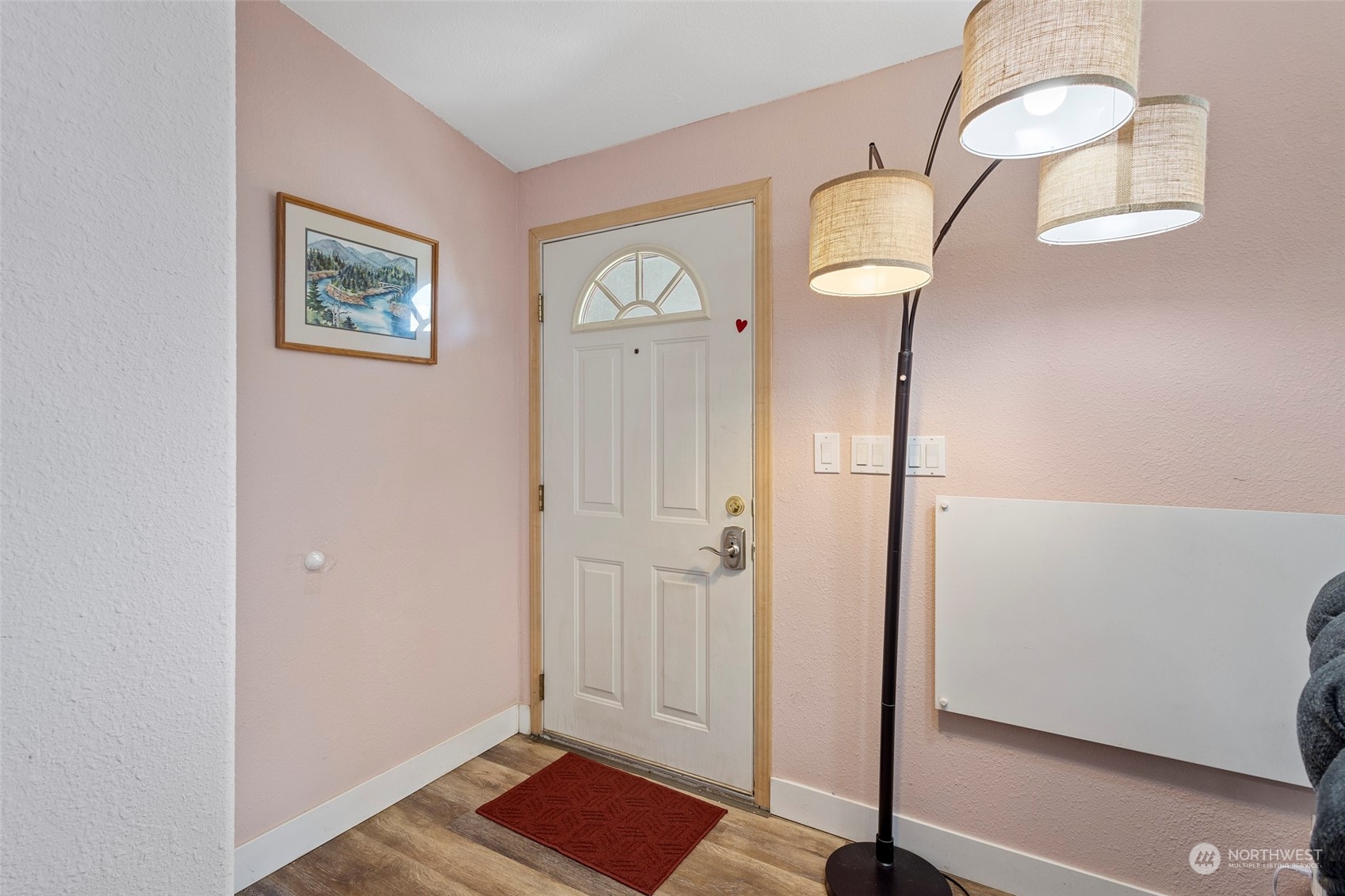 13846 Avon Allen Road Mount Vernon, WA 98273 - Photo 6 of 36 a view of a hallway with wooden floor and closet
