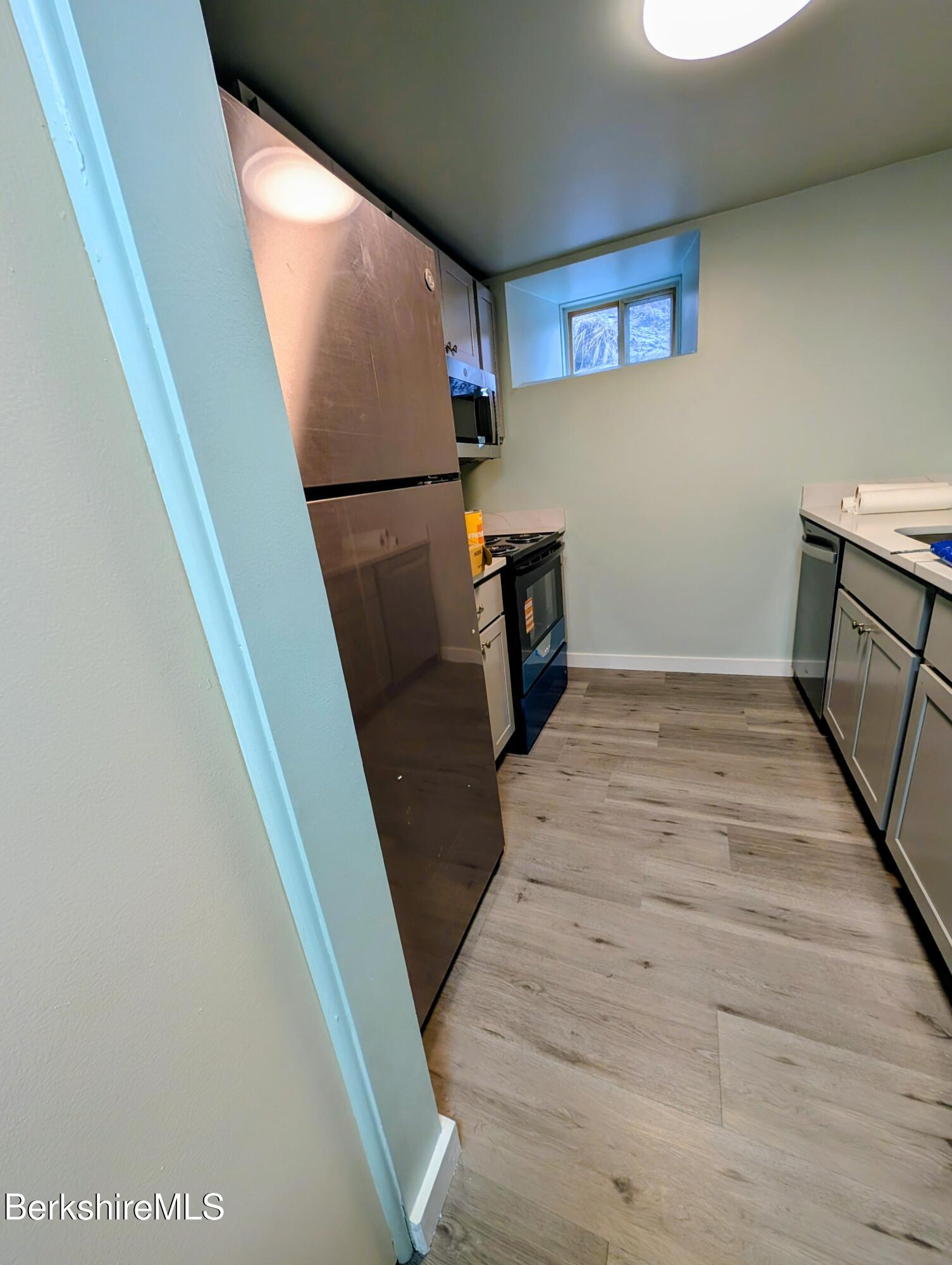 1 Pebble Street, Unit B North Adams, MA 01247 - Photo 4 of 14 a view of a hallway to a house