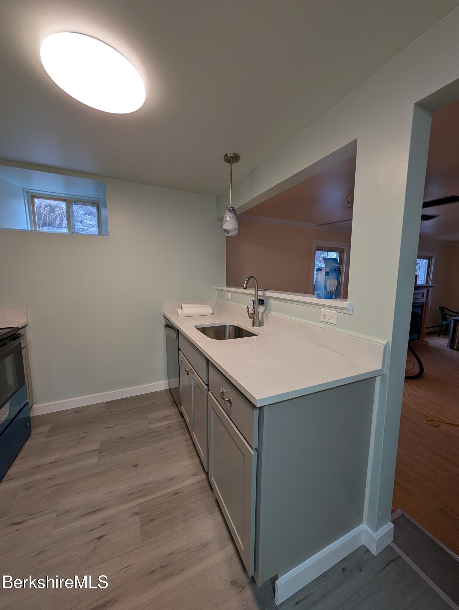 1 Pebble Street, Unit B North Adams, MA 01247 - Photo 5 of 14 a utility room with washer and dryer
