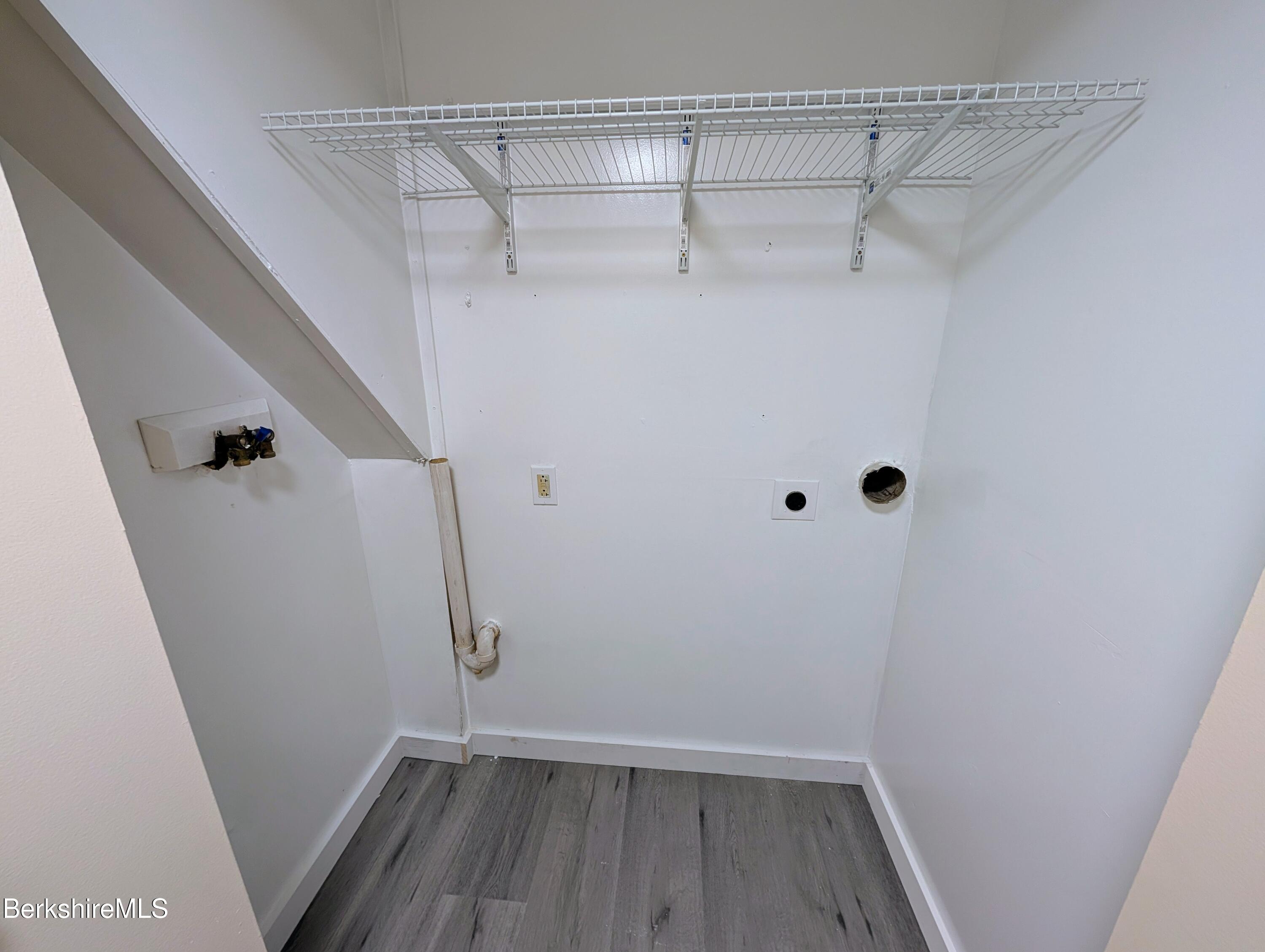 1 Pebble Street, Unit B North Adams, MA 01247 - Photo 7 of 14 a view of walk in closet with empty racks