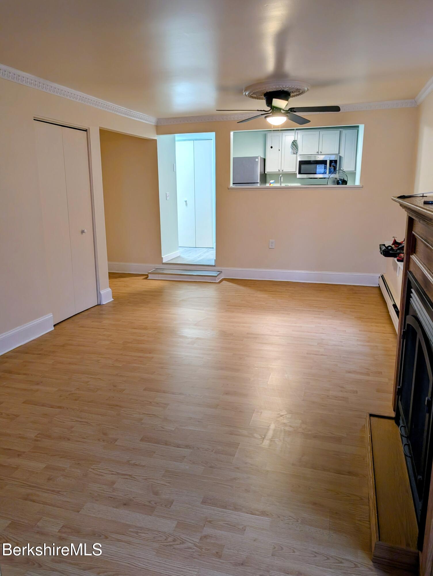 1 Pebble Street, Unit B North Adams, MA 01247 - Photo 9 of 14 a view of room with window and wooden floor