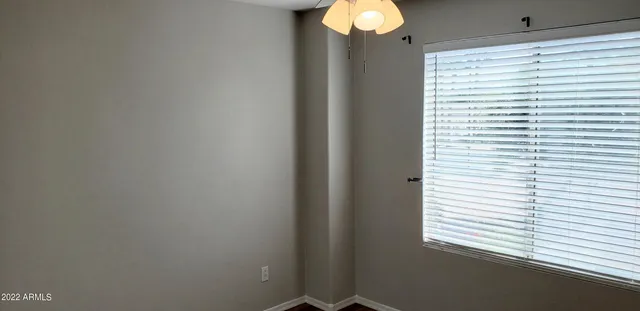 a view of a room that has a window