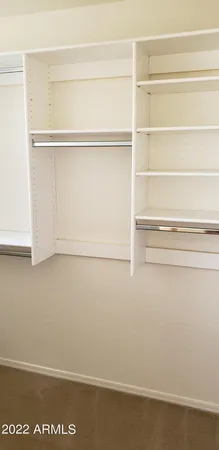 a view of small space with racks on the wall