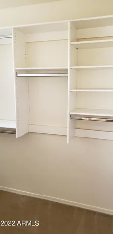 a view of small space with racks on the wall