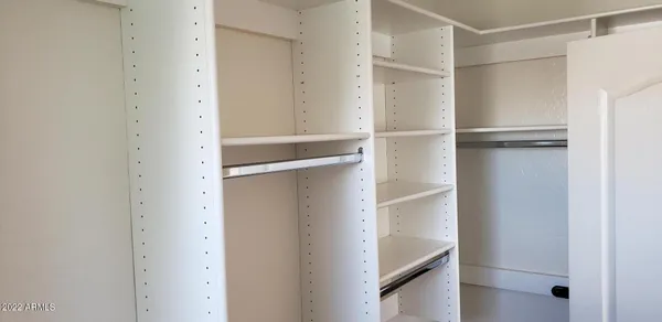a view of an empty walk in closet