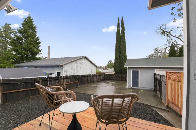 a view of house with outdoor seating space