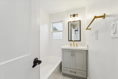 a view of a hallway with windows