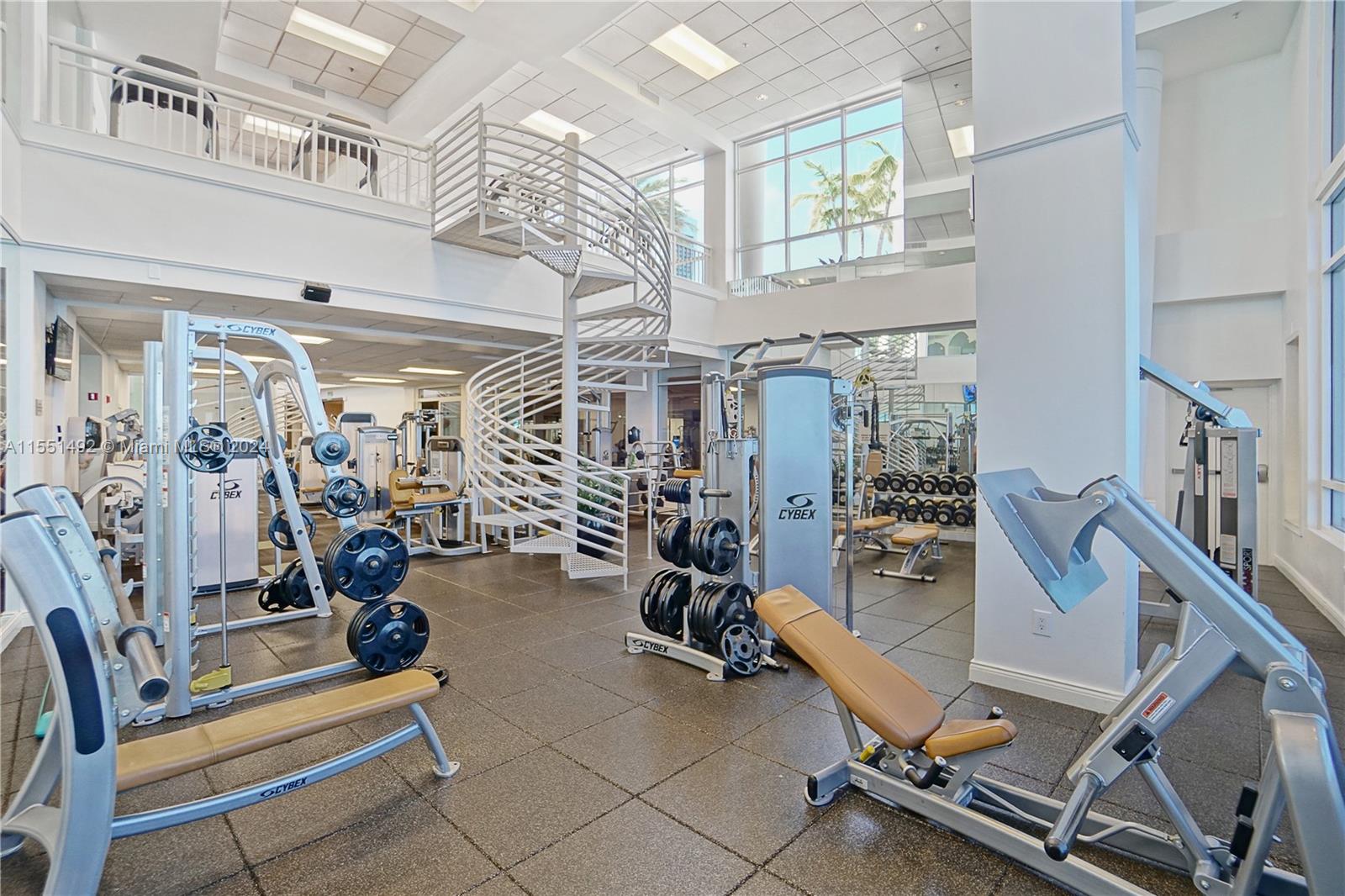 848 Brickell Key Drive, Unit 2003 Miami, FL 33131 - Photo 29 of 35 a view of a room with gym equipment