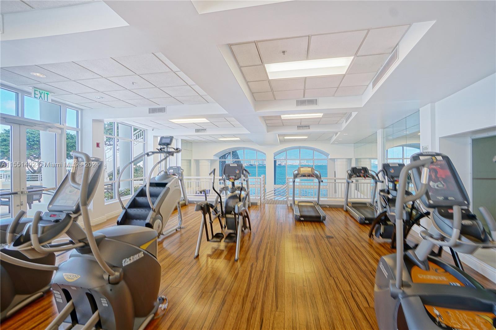848 Brickell Key Drive, Unit 2003 Miami, FL 33131 - Photo 31 of 35 a view of a room with gym equipment