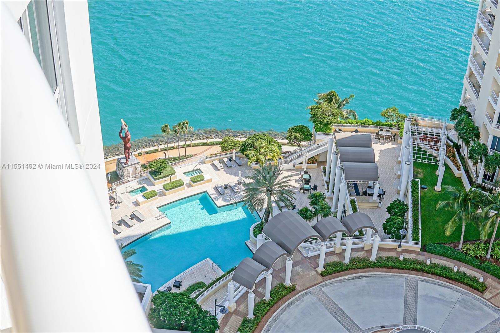848 Brickell Key Drive, Unit 2003 Miami, FL 33131 - Photo 5 of 35 an aerial view of a house with outdoor space patio and outdoor seating