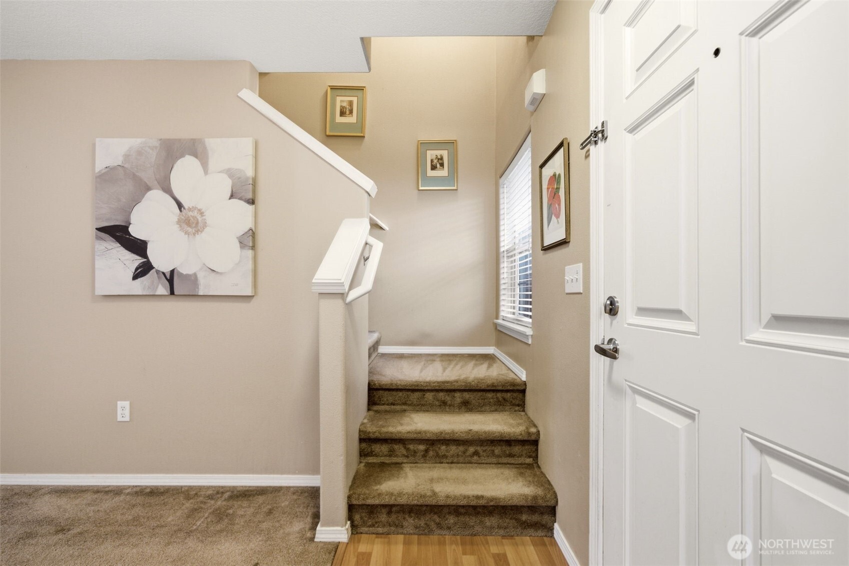 1205 Northeast 165th Way Ridgefield, WA 98642 - Photo 18 of 38 a view of staircase with white walls and a window