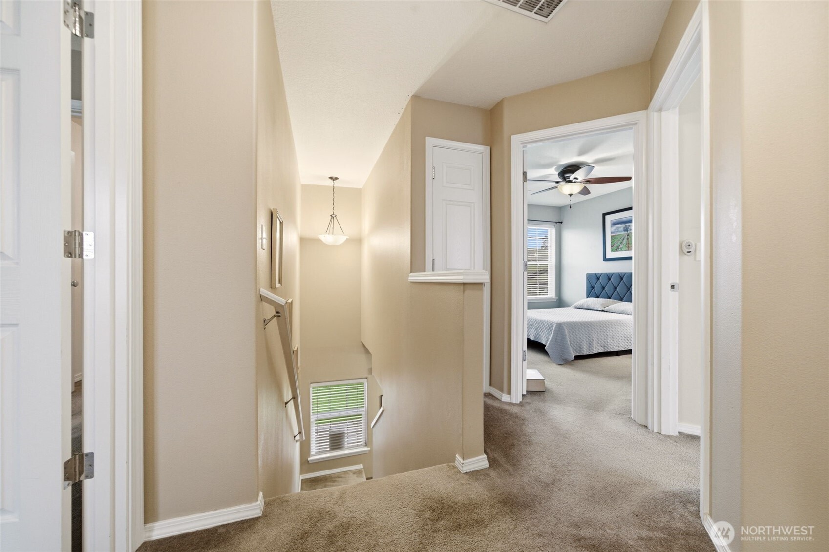 1205 Northeast 165th Way Ridgefield, WA 98642 - Photo 19 of 38 a view of a bedroom with a furniture and a bathroom