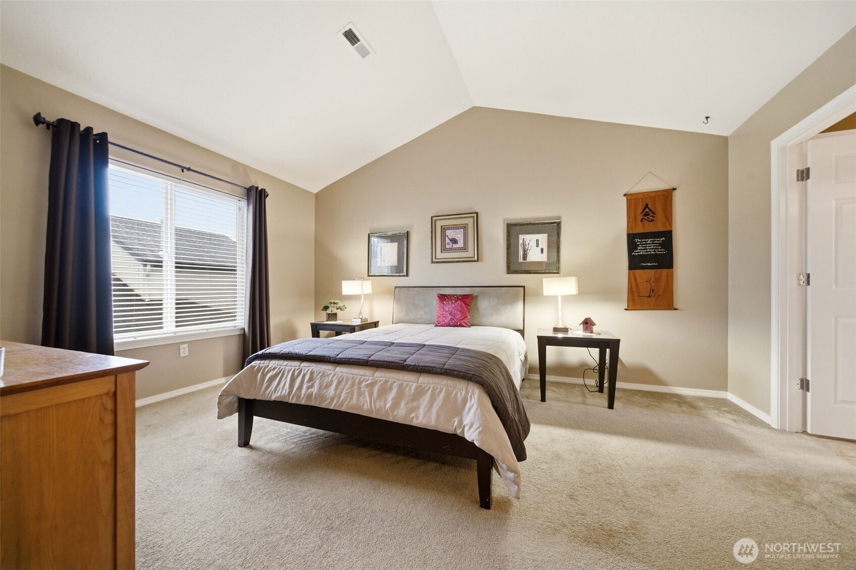 1205 Northeast 165th Way Ridgefield, WA 98642 - Photo 20 of 38 a spacious bedroom with a bed and a window