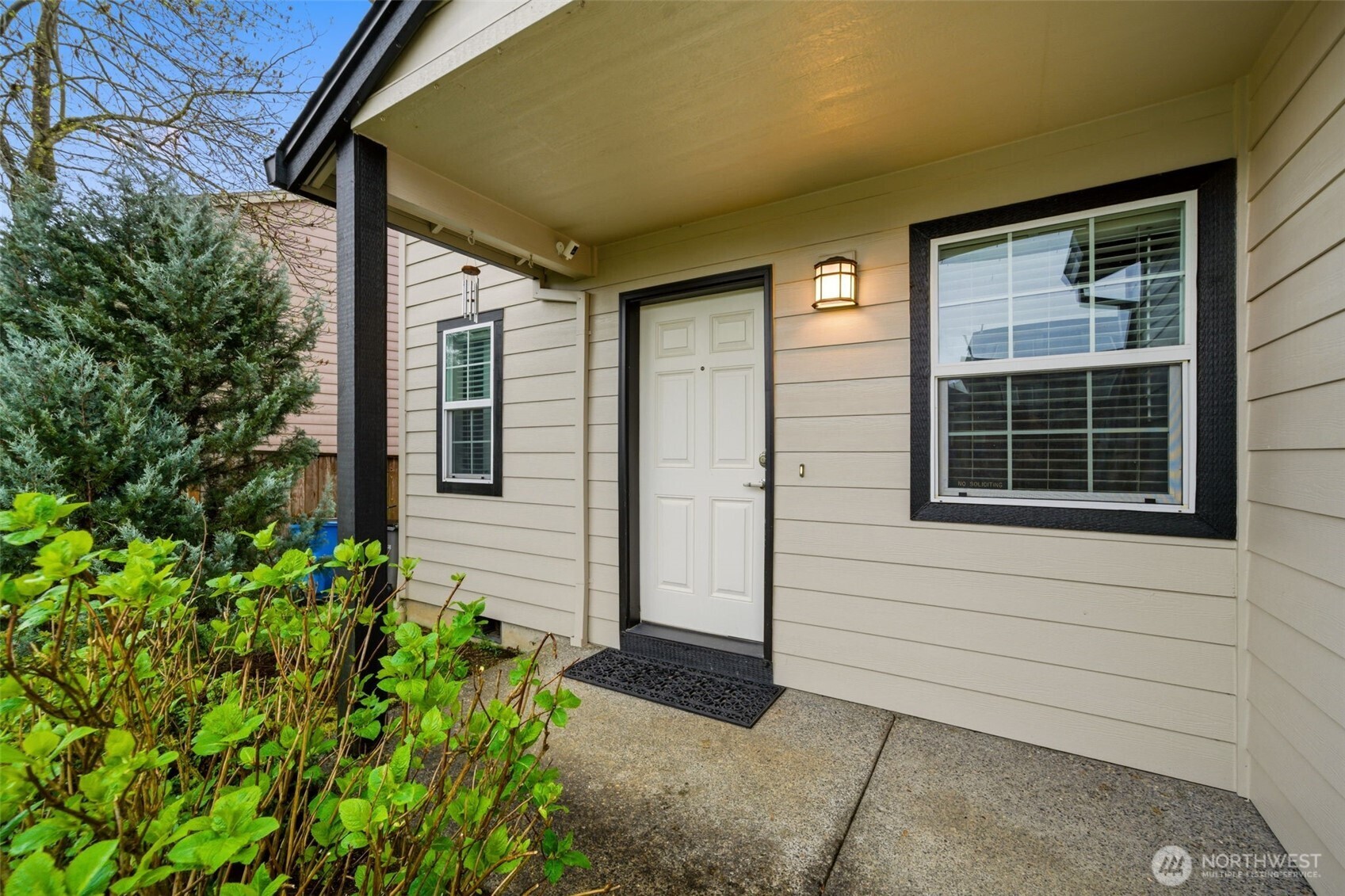 1205 Northeast 165th Way Ridgefield, WA 98642 - Photo 4 of 38 a front view of a house with a yard