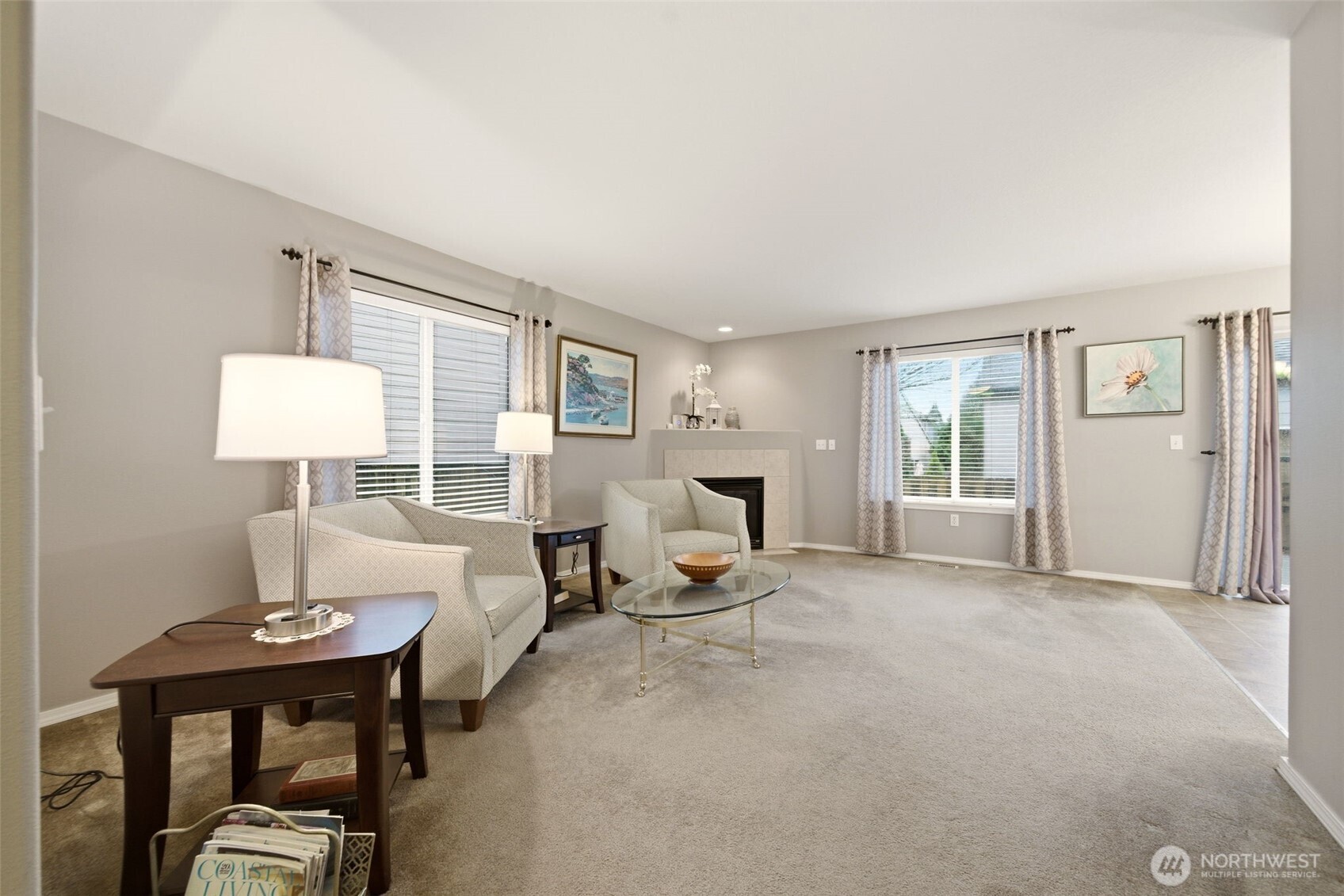 1205 Northeast 165th Way Ridgefield, WA 98642 - Photo 6 of 38 a living room with furniture and a table