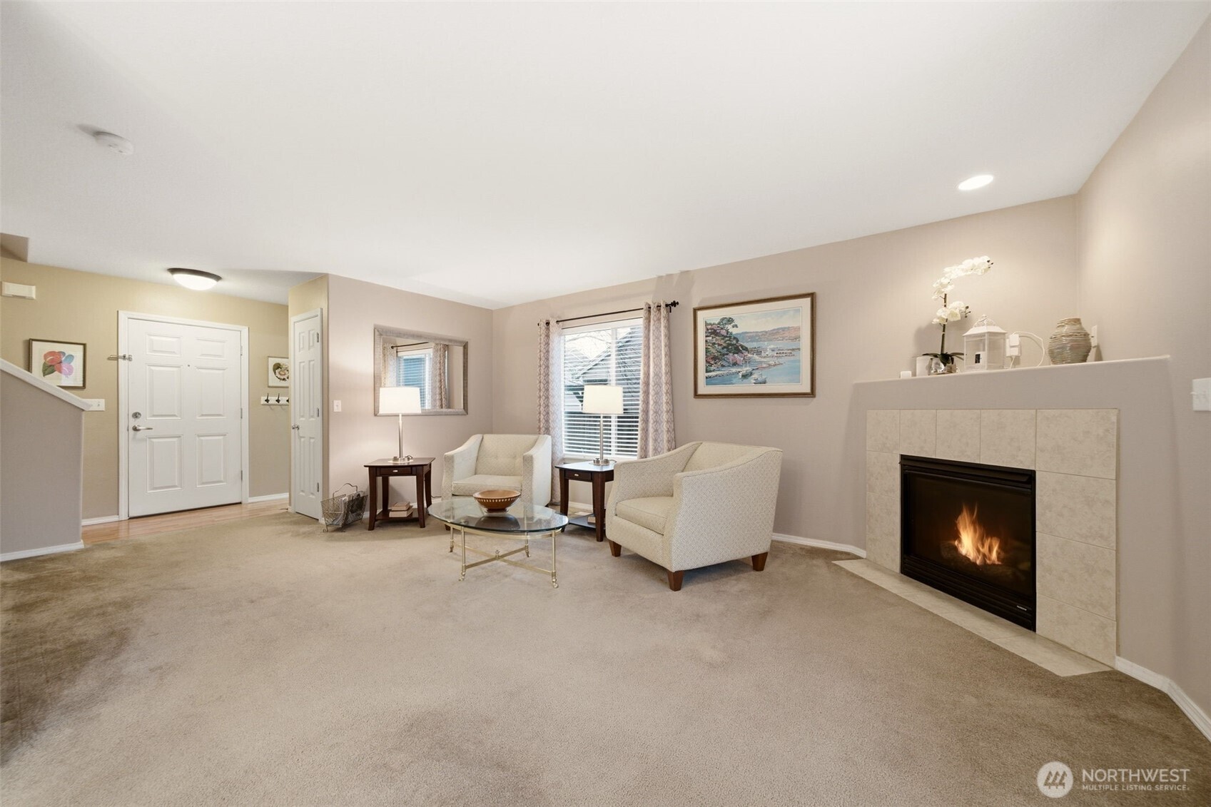 1205 Northeast 165th Way Ridgefield, WA 98642 - Photo 8 of 38 a living room with furniture and a fireplace