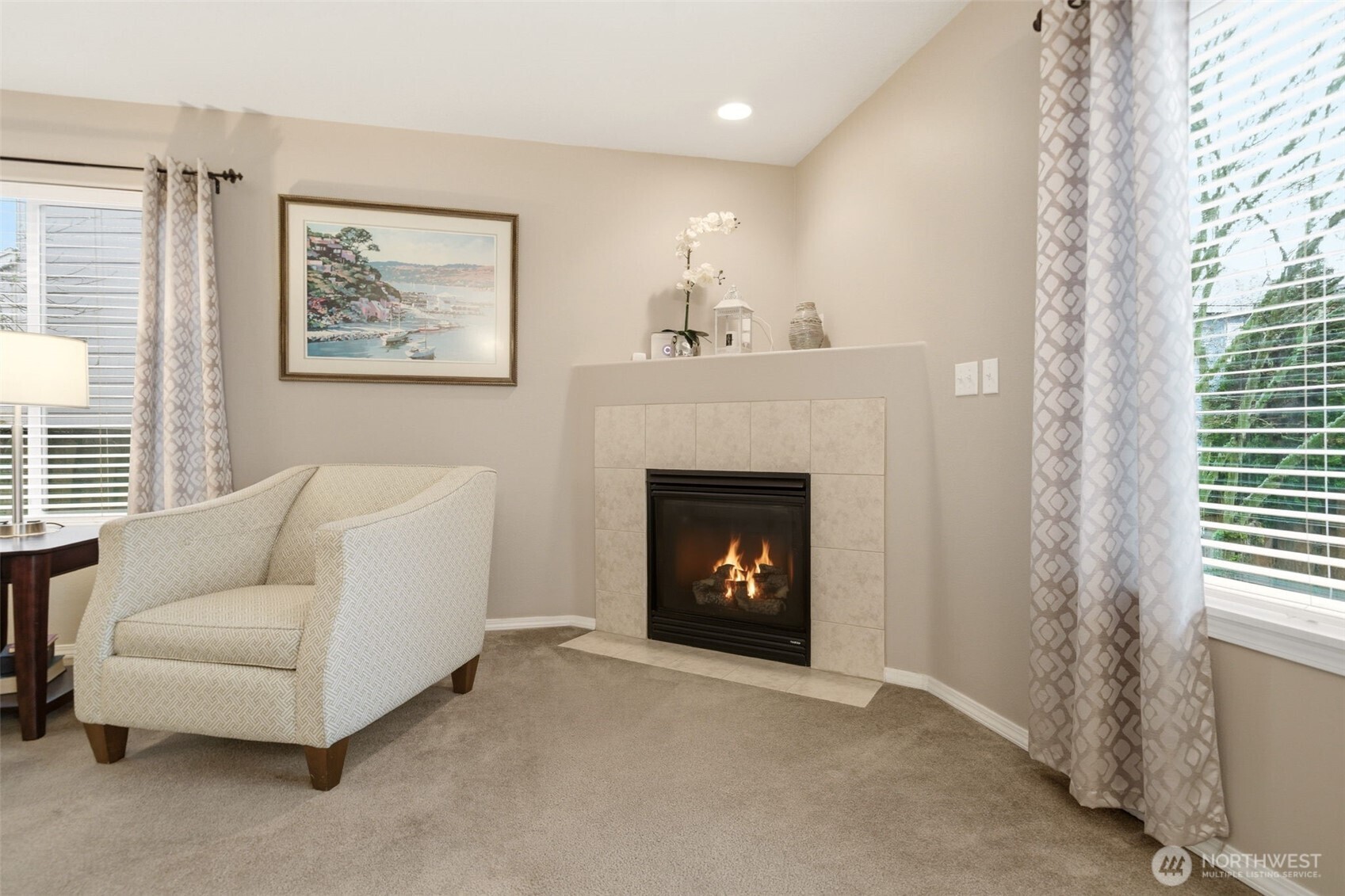 1205 Northeast 165th Way Ridgefield, WA 98642 - Photo 9 of 38 a living room with furniture and a fireplace