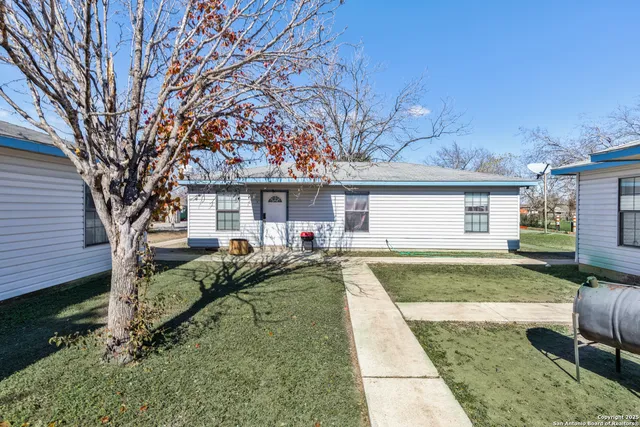 front view of a house with a patio