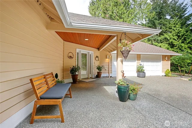 a view of sitting area in front of house