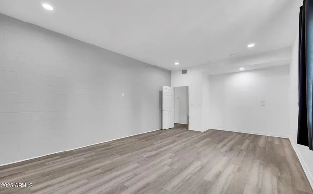 a bathroom with a sink a toilet and a shower