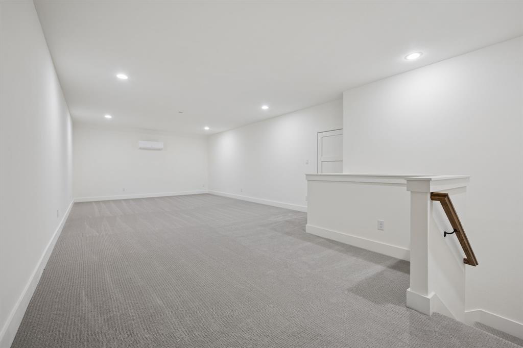 105 Buckboard Trail Oak Point, TX 75068 - Photo 21 of 27 700 sf bedroom/guest retreat/flex space on 2nd story.
