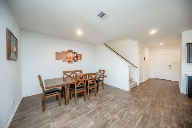 a view of a dining room with furniture