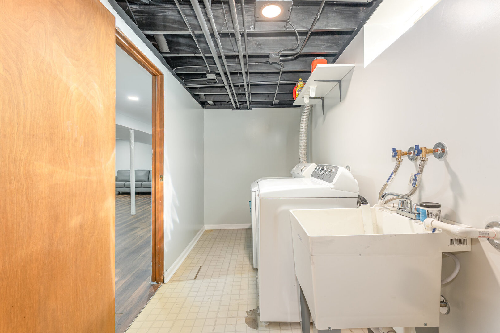 8108 North Overhill Avenue Niles, IL 60714 - Photo 14 of 18 a bathroom with a sink and mirror