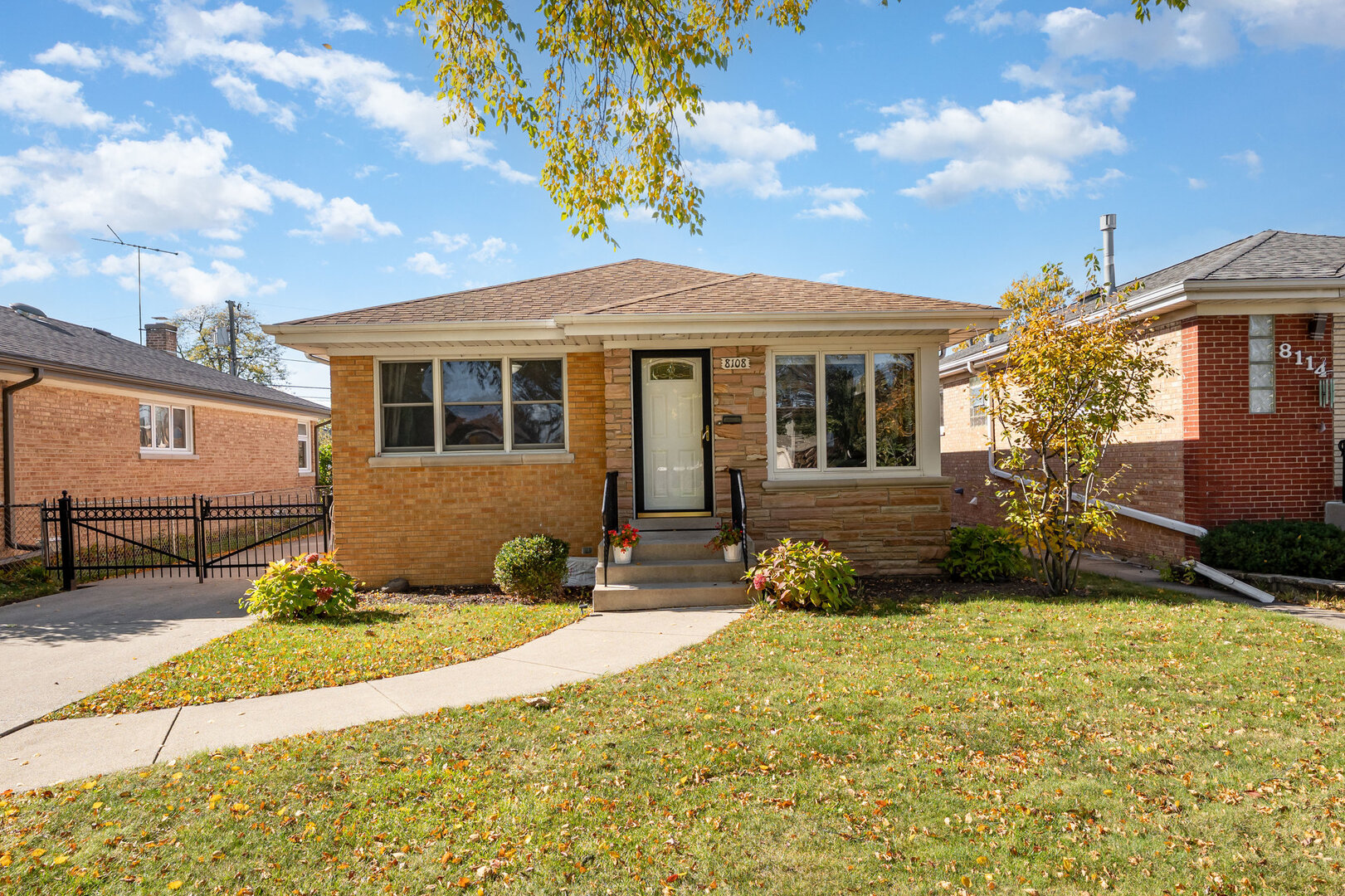 8108 North Overhill Avenue Niles, IL 60714 - Photo 16 of 18 a view of a house with a patio