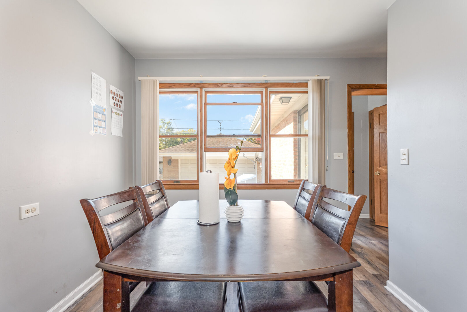 8108 North Overhill Avenue Niles, IL 60714 - Photo 4 of 18 a view of a dining room with furniture window and outside view