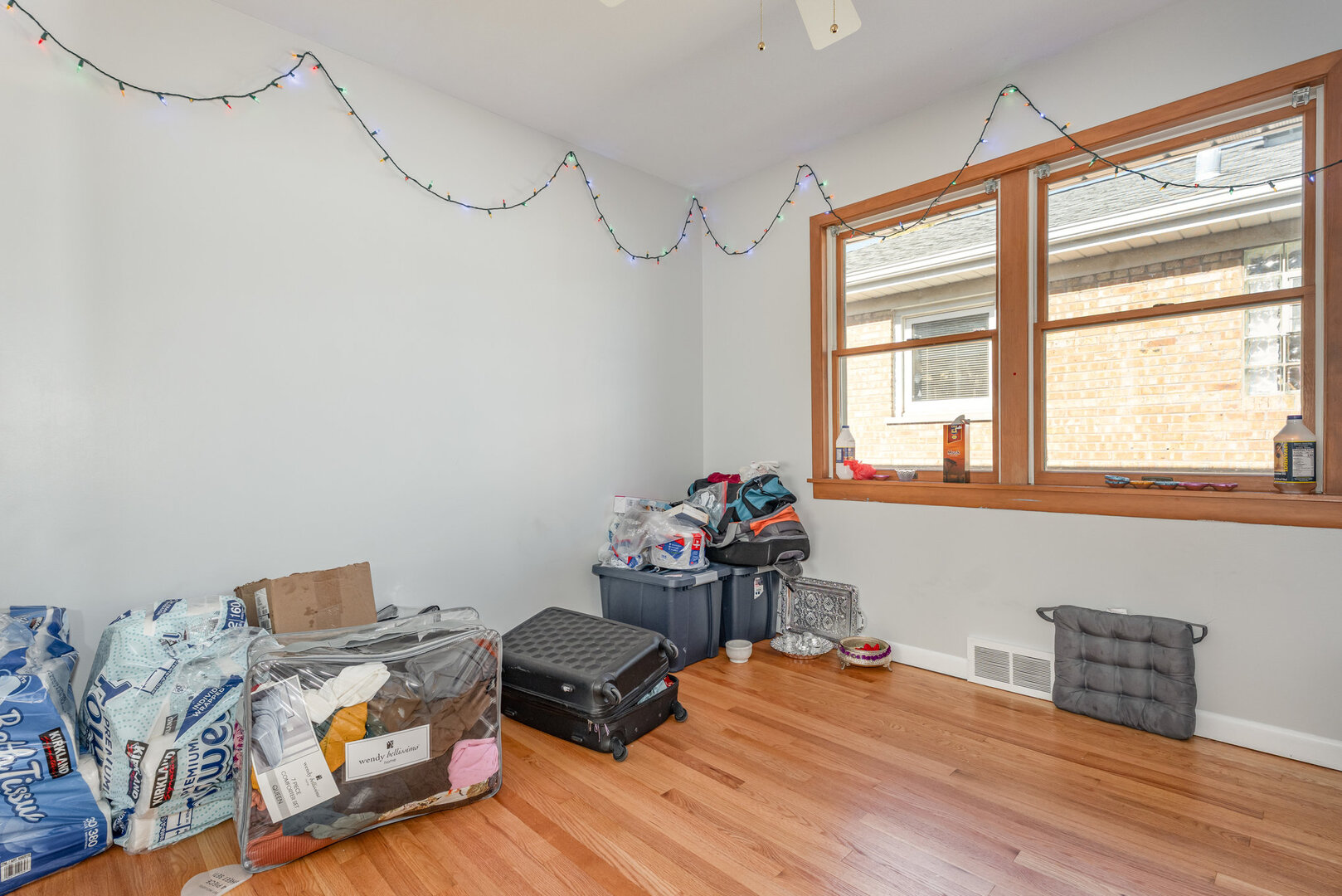 8108 North Overhill Avenue Niles, IL 60714 - Photo 10 of 18 a bedroom with bed and a window