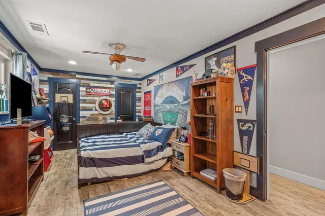 a bathroom with a granite countertop sink mirror and shower
