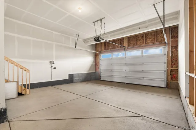 a view of a store room cabinets and chandelier