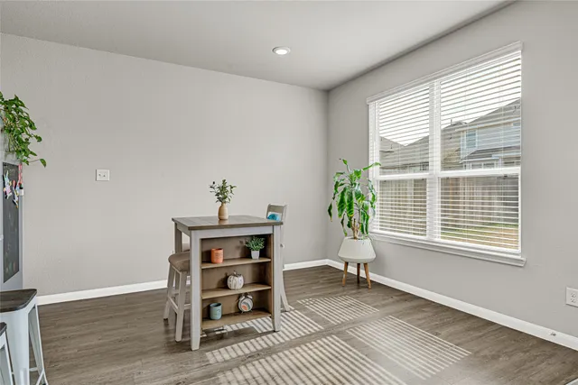 a workspace with furniture and a window