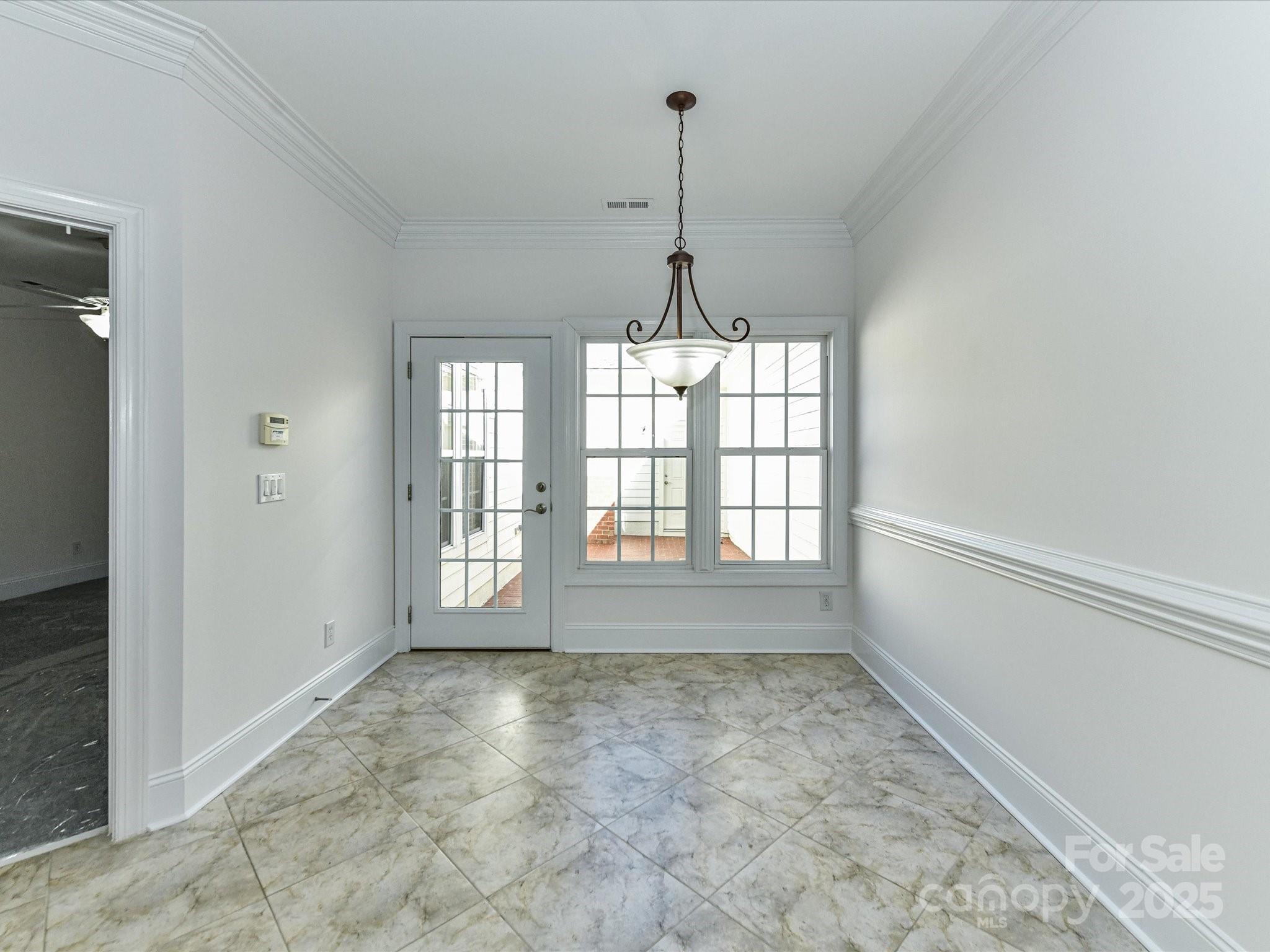 155 Harper Lee Street Davidson, NC 28036 - Photo 12 of 26 a view of an empty room with a window