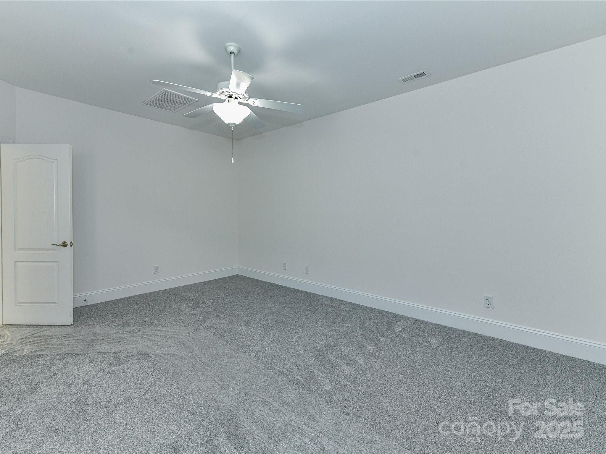 155 Harper Lee Street Davidson, NC 28036 - Photo 14 of 26 wooden floor in an empty room