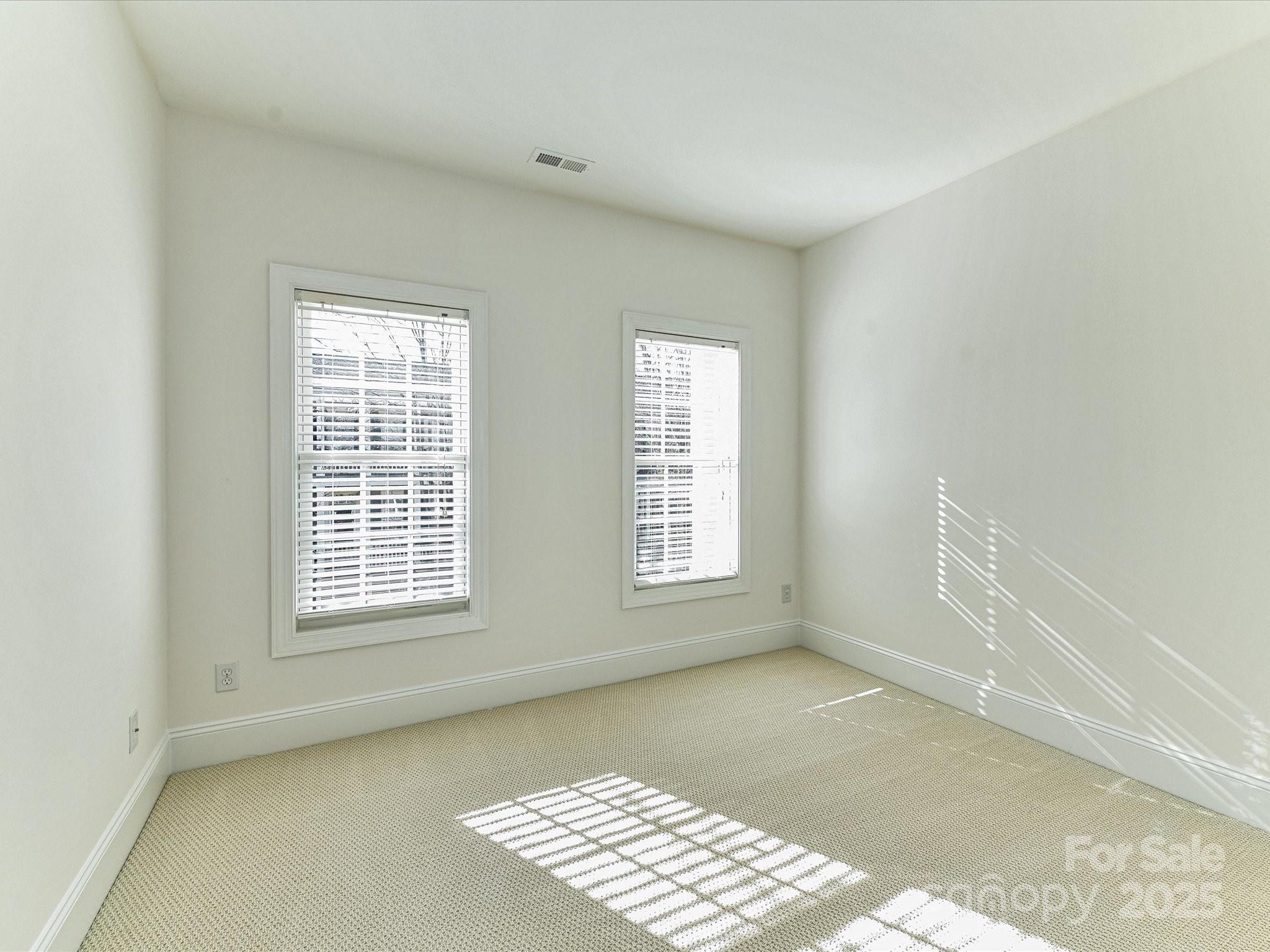 155 Harper Lee Street Davidson, NC 28036 - Photo 23 of 26 a view of an empty room with a window
