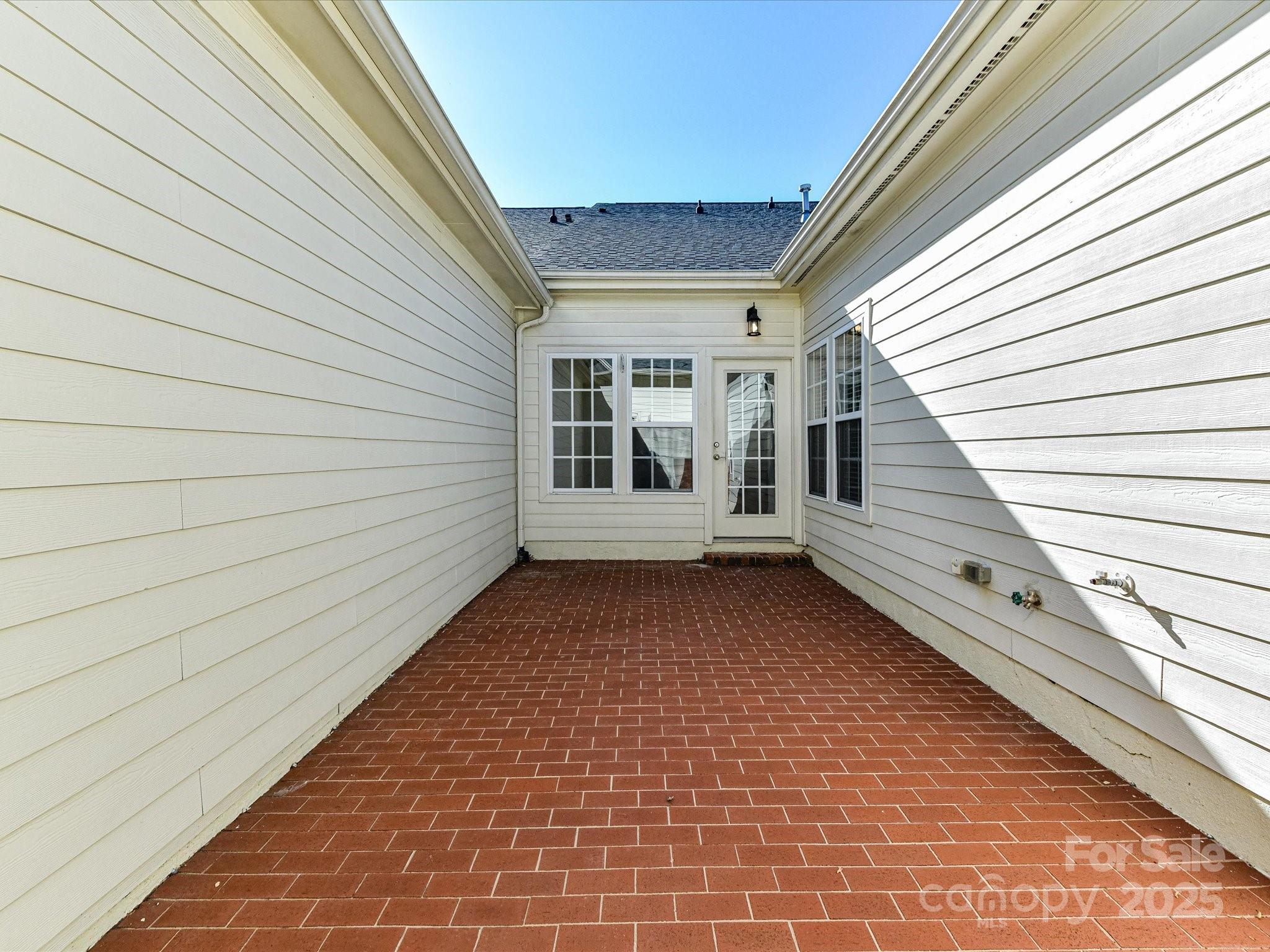 155 Harper Lee Street Davidson, NC 28036 - Photo 24 of 26 a view of a balcony with window