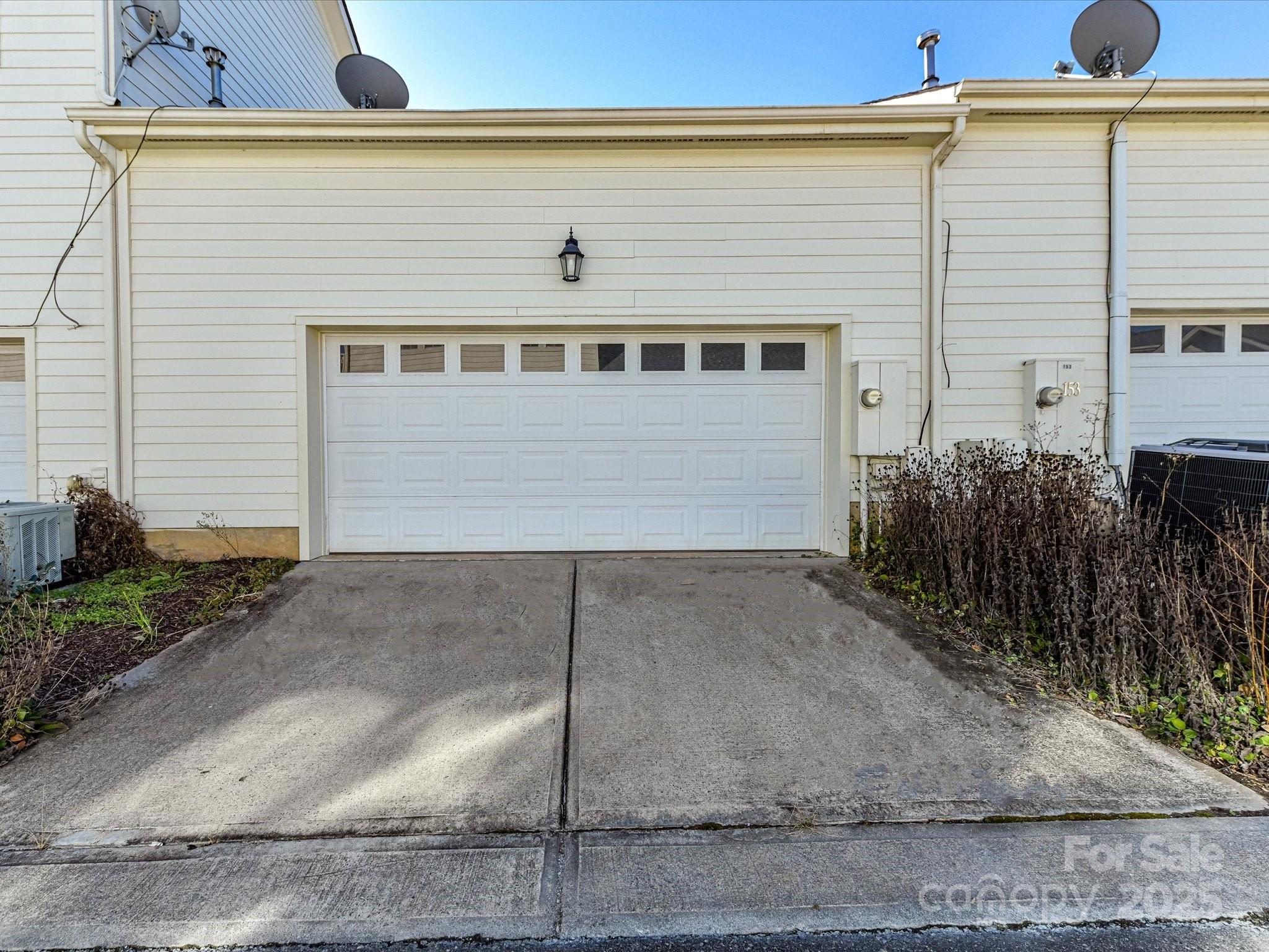 155 Harper Lee Street Davidson, NC 28036 - Photo 25 of 26 a front view of a house with garage