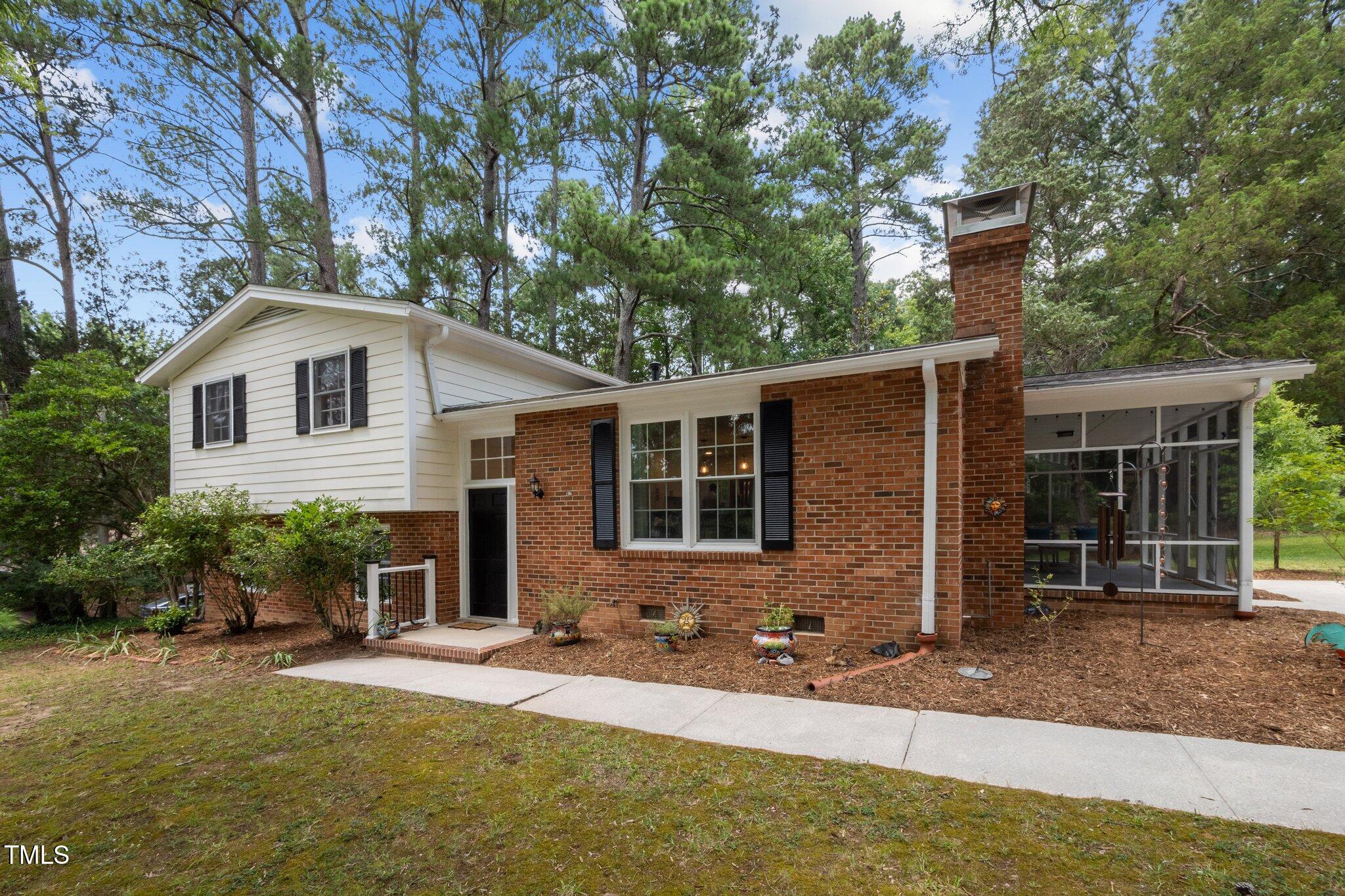 1205 Willow Drive Chapel Hill, NC 27517 - Photo 7 of 45 front view of house with a yard