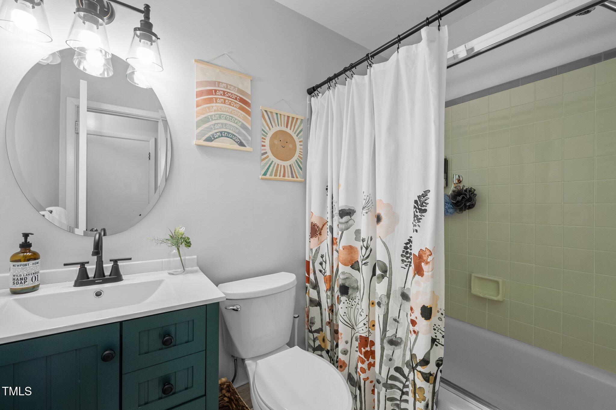 1205 Willow Drive Chapel Hill, NC 27517 - Photo 20 of 45 a bathroom with a sink toilet and shower