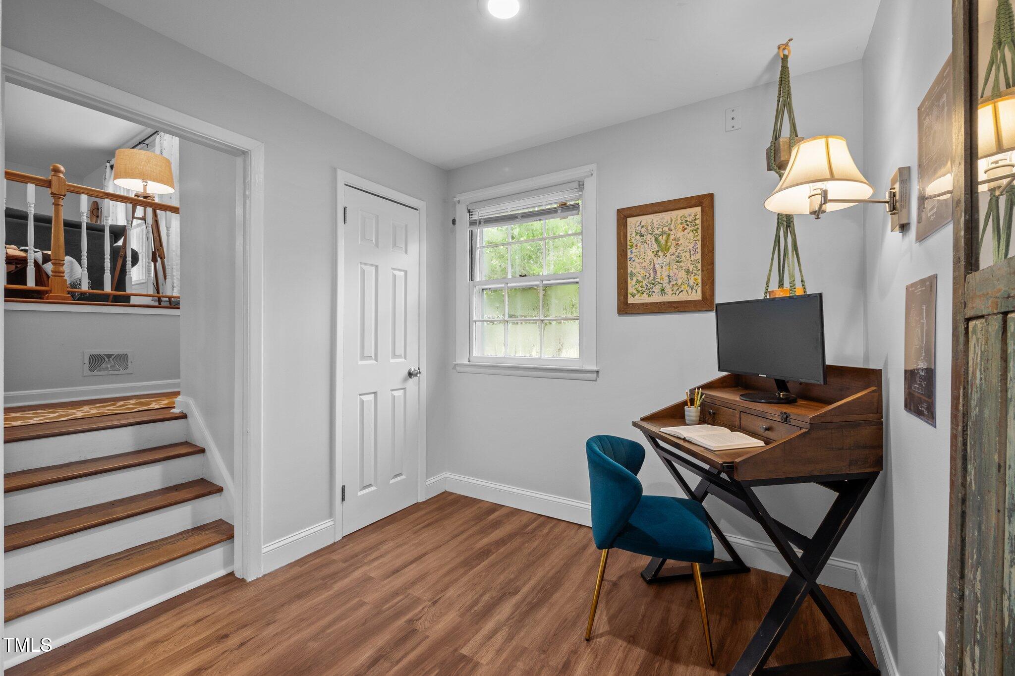 1205 Willow Drive Chapel Hill, NC 27517 - Photo 21 of 45 a view of a workspace with furniture and a window