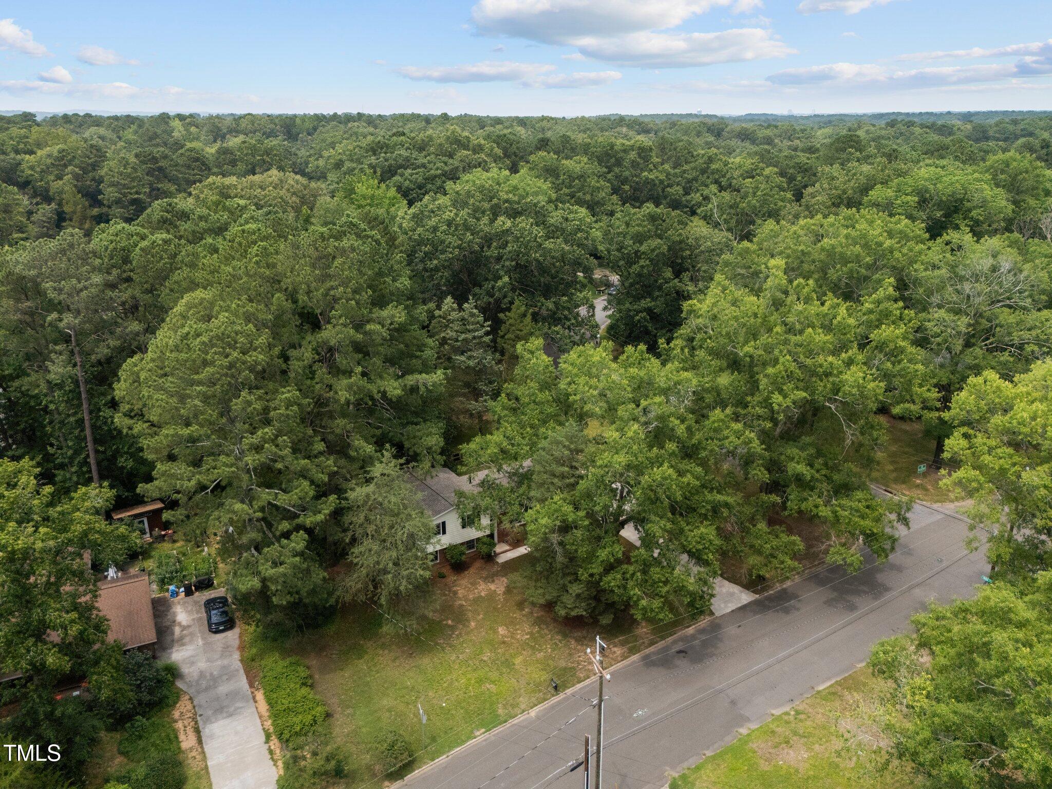 1205 Willow Drive Chapel Hill, NC 27517 - Photo 30 of 45 an aerial view of residential houses with outdoor space and trees