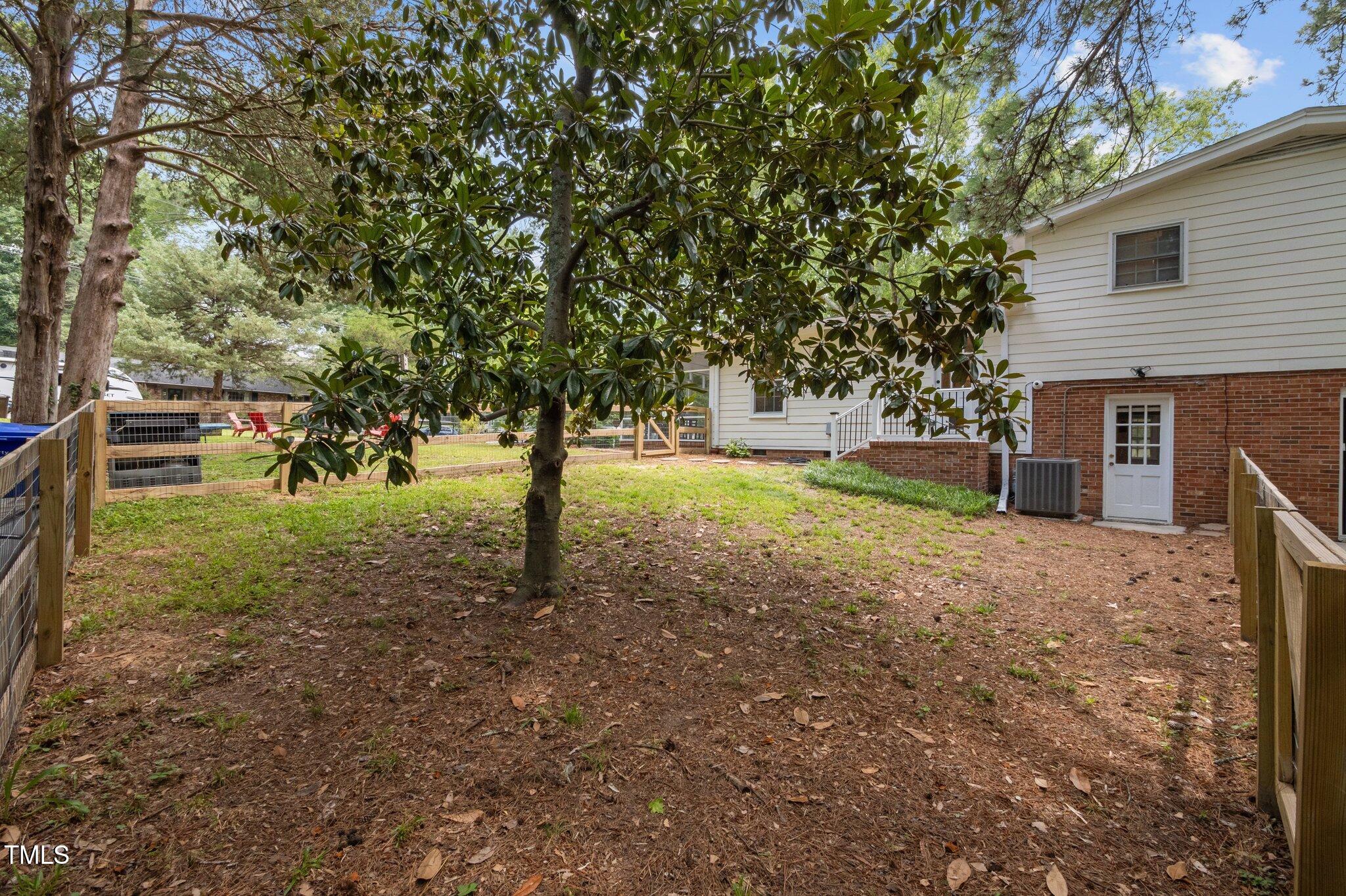 1205 Willow Drive Chapel Hill, NC 27517 - Photo 37 of 45 a view of a yard with large trees
