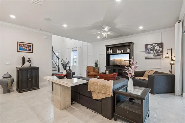 a kitchen with kitchen island a sink stove and refrigerator
