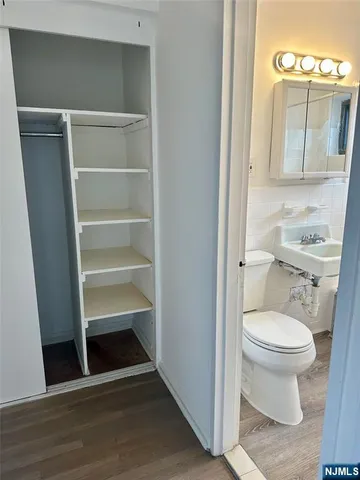 a bathroom with a toilet and a sink