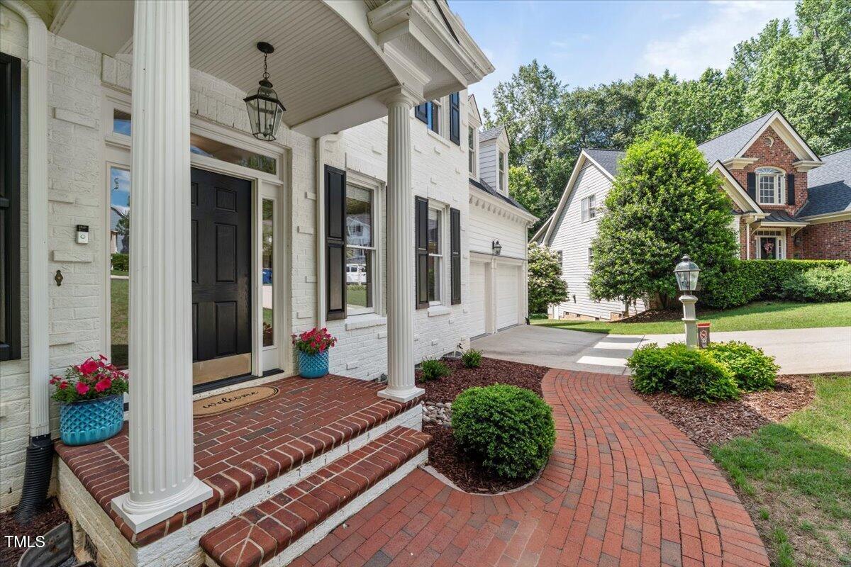1404 Kings Lassiter Way Raleigh, NC 27614 - Photo 28 of 28 a front view of a house with garden