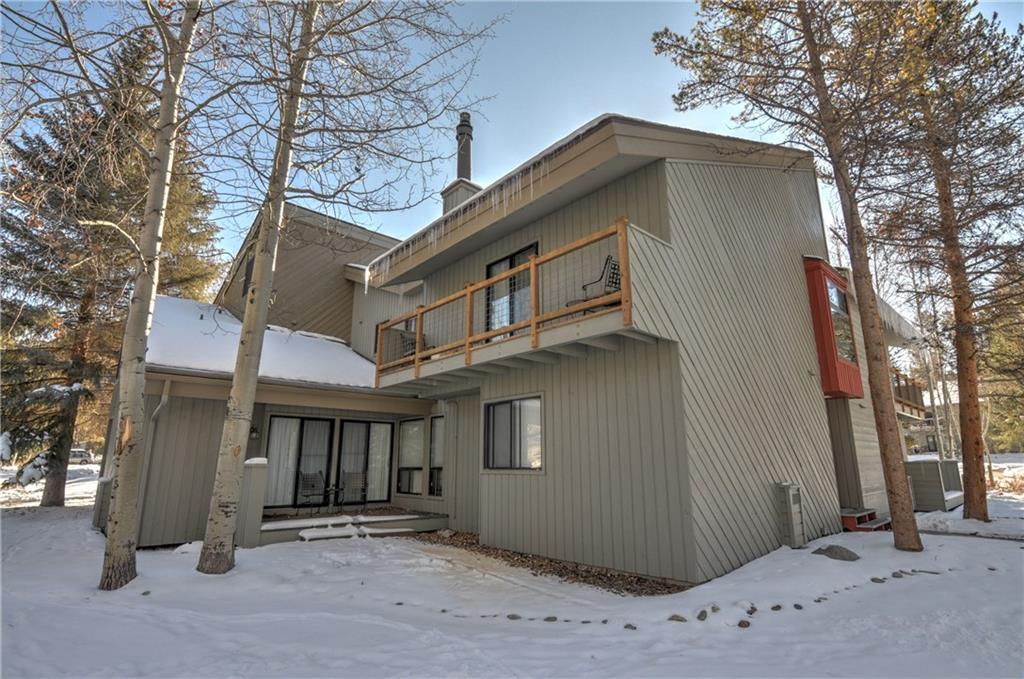 1977 Soda Ridge Road, Unit 1218 Keystone, CO 80435 - Photo 18 of 23 a front view of a house with a tree