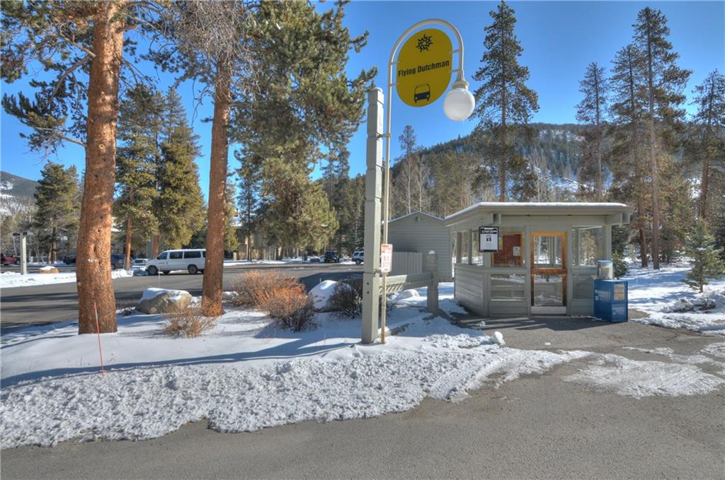 1977 Soda Ridge Road, Unit 1218 Keystone, CO 80435 - Photo 23 of 23 a view of a house with a yard and sitting area