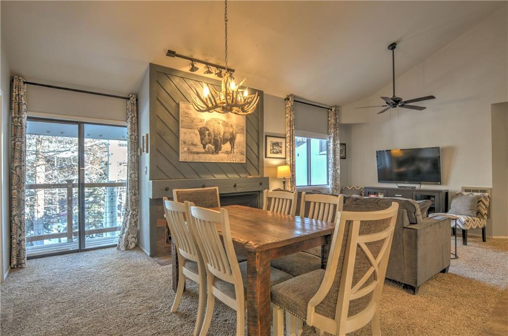 1977 Soda Ridge Road, Unit 1218 Keystone, CO 80435 - Photo 7 of 23 a view of a dining room with furniture window and outside view